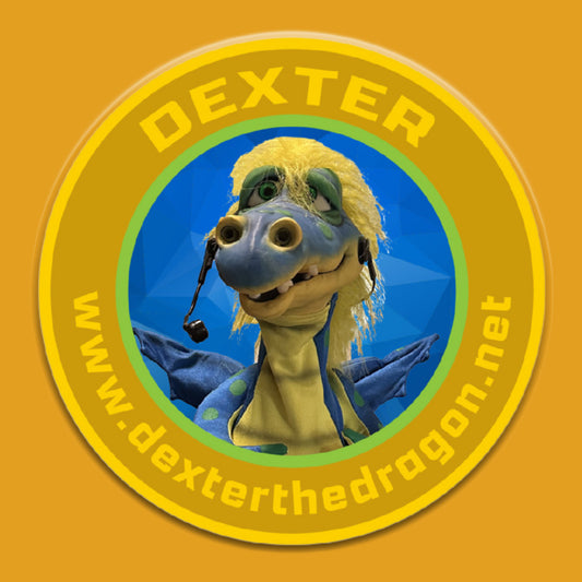 Circular logo featuring a cartoon dragon named Dexter with a yellow border and blue background.