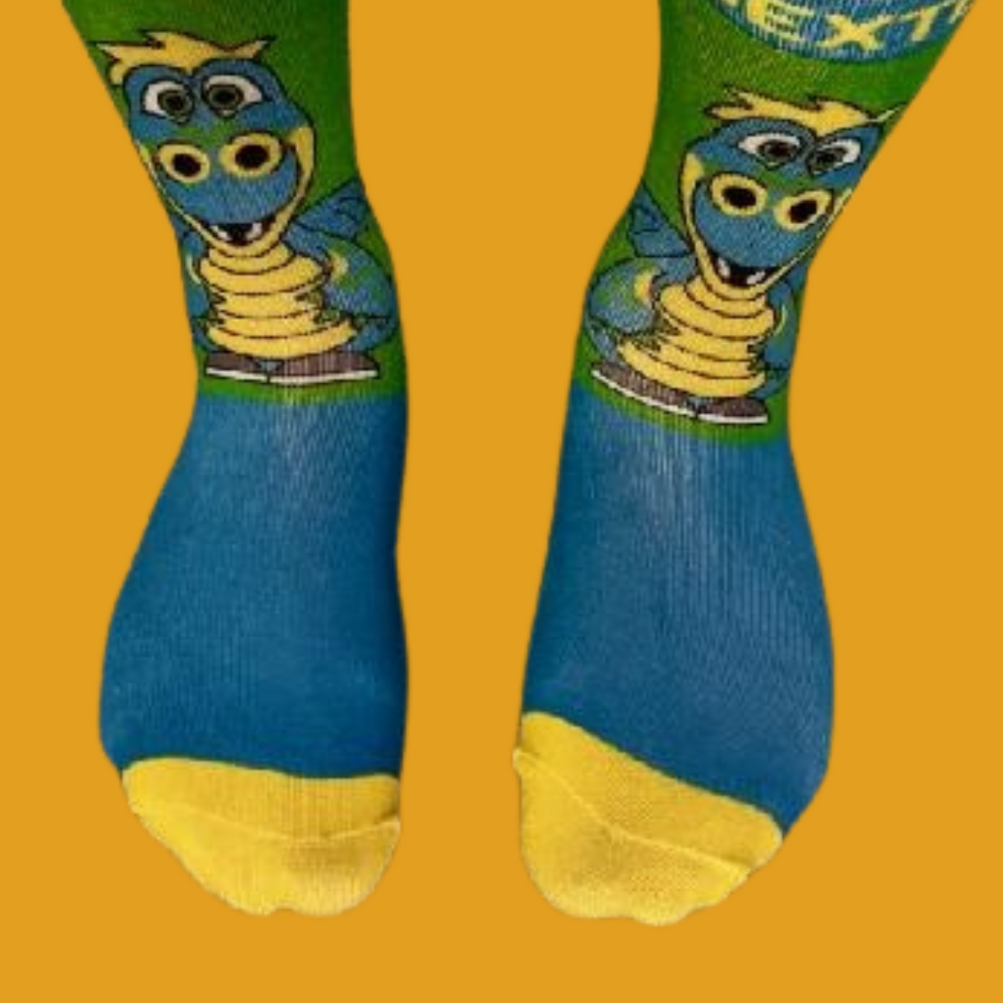 Blue socks with cartoon character design on a yellow background
